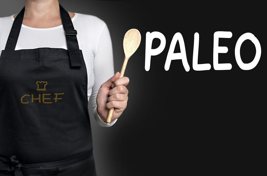 paleo recipes - paleo cook holding wooden spoon