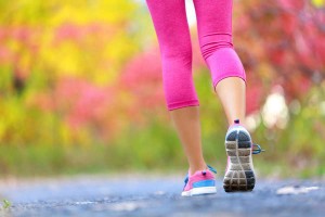 Jogging woman with athletic legs