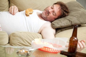 Man lying down after a meal - natural remedies for acid reflux disease